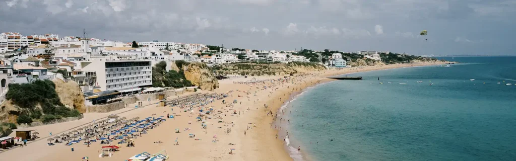 Aerial view of beach in Algarve, Portugal - Golden Visa programs for Indians