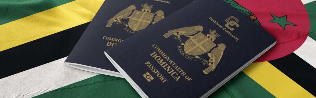 dominica passports laid down on a dominica flag