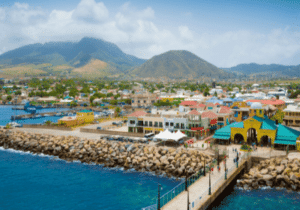 Cruise ship dock in Basseterre, St Kitts and Nevis island with mountains in background - fast CBI program in Caribbean