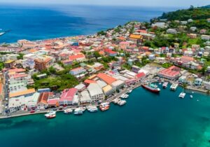 Ocean shoreline of the capital of St George's in Grenada from the air - fast CBI programs to apply for