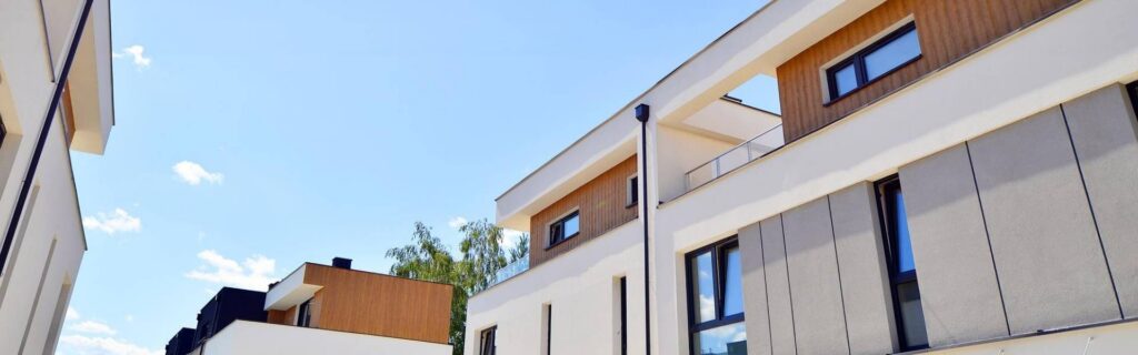 luxury multistorey apartment building with a blue sky background