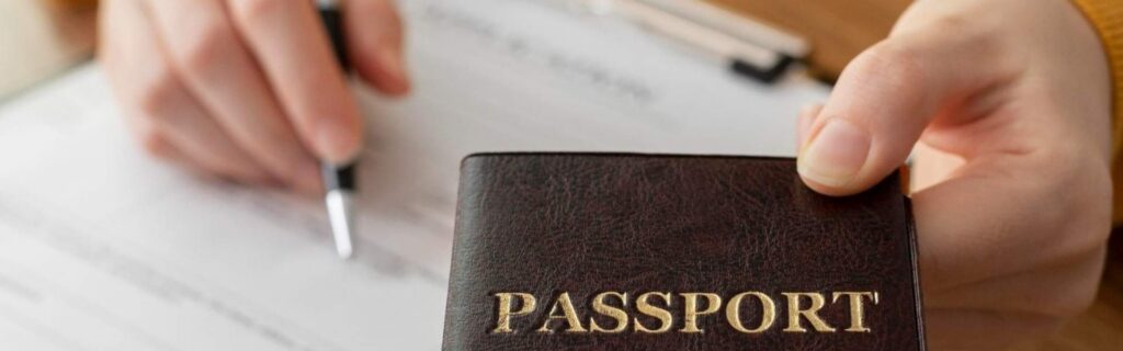 person filling out an application form for a st lucia passport