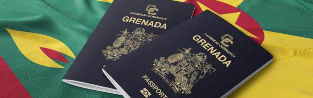 two grendian passports laid on a flag of grenada