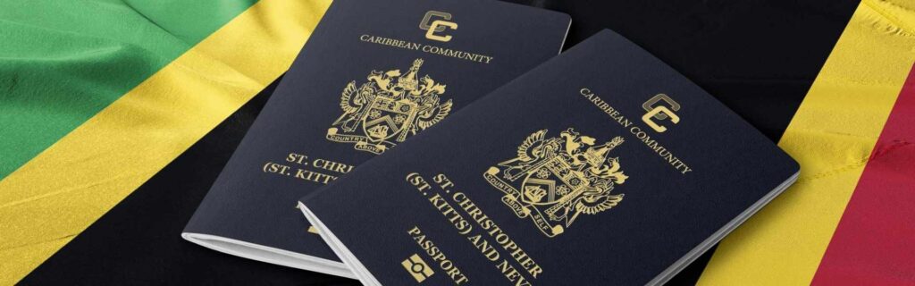 two saint kitts passports on a st kitts and nevis flag
