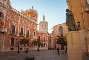 Red brick buildings in a city in Spain. 