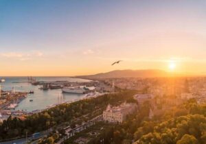 An aerial view of Malaga, Spain during golden hour. 