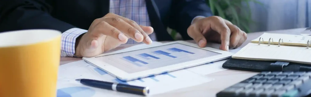 Person looking at information for investment