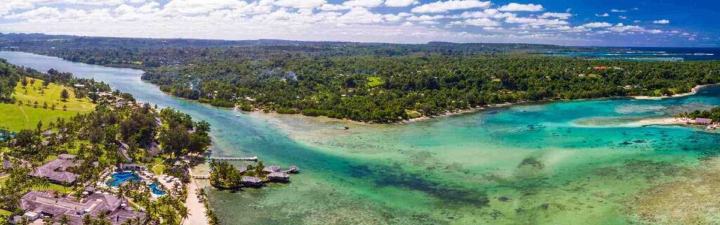 aerial view of port vila, vanuatu, with buildings, land, and water