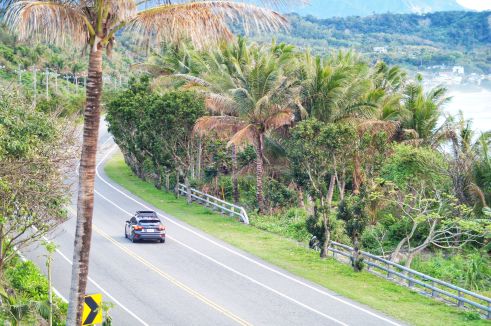car driving on a road in antigua and barbdua