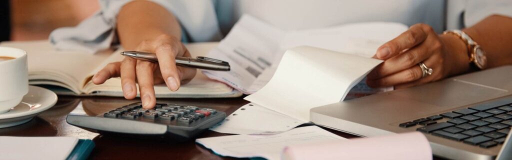 person calculating vanuatu passport fee