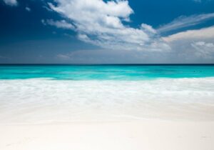 View of the bright blue ocean in Seychelles - zero income tax country