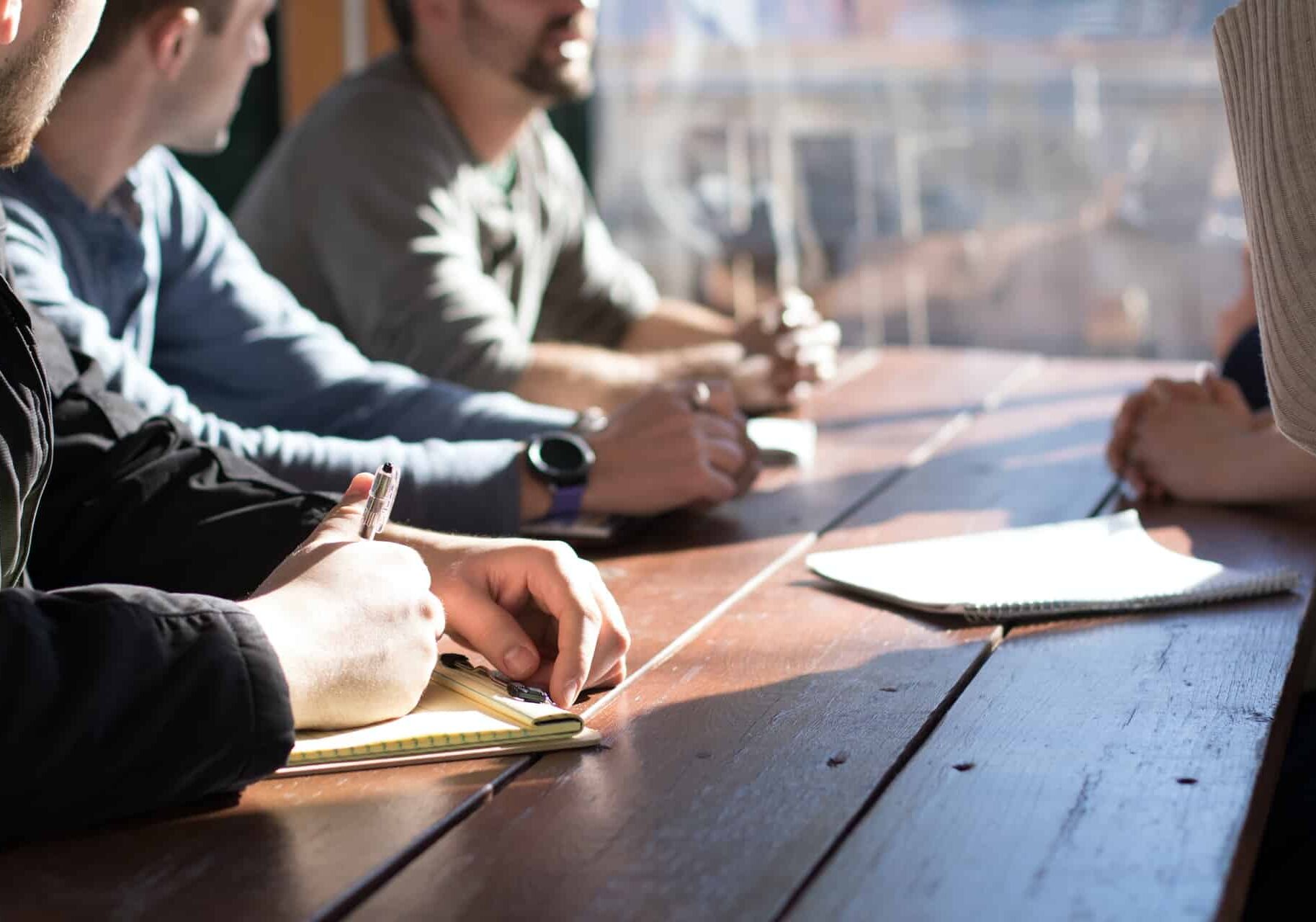 people having a work meeting