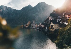 Buildings on a hillside in the Austrian historic town called Hallstatt - Austrian residency by investment