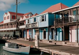 Colorful buildings on the shoreline in Antigua and Barbuda - where to invest in real estate overseas