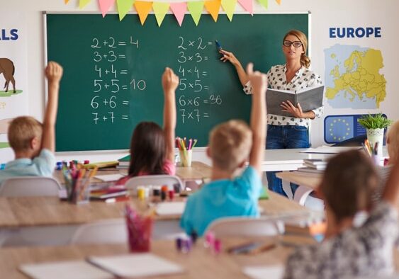 Children participating in a classroom