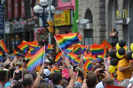 People waving pride flags during a movement 