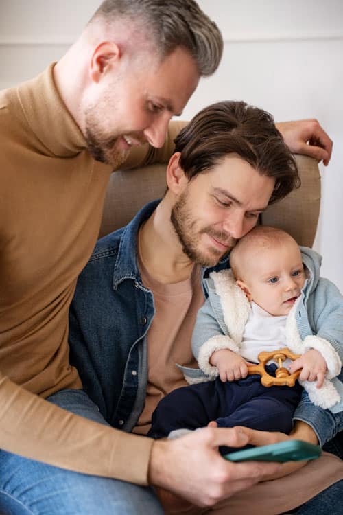 A gay couple with a child 