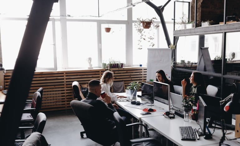 people working in an office in grenada