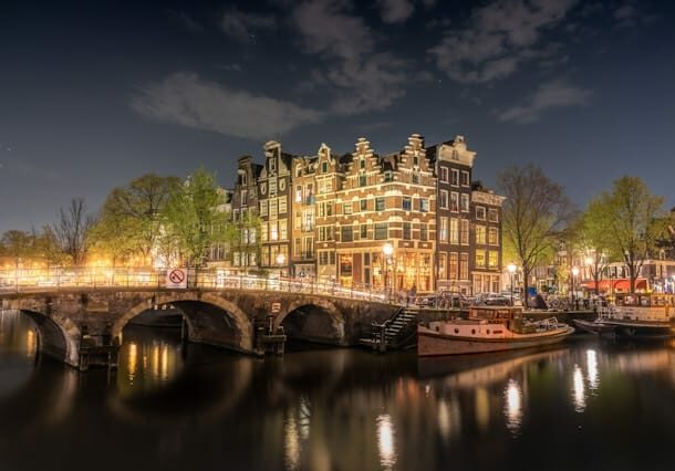 Night view of Papiermolensluis in-between the Amsterdam canals - best residence for entrepreneurs