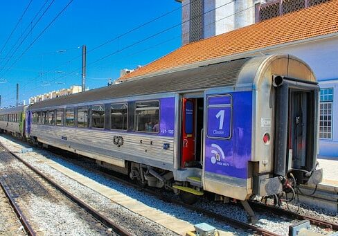 A train waiting a train station. 