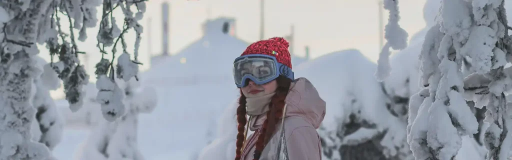 woman in a snowing scenery in Finland