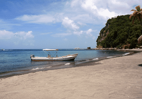 a boat shored up on Anse Chastanet Beach in St Lucia
