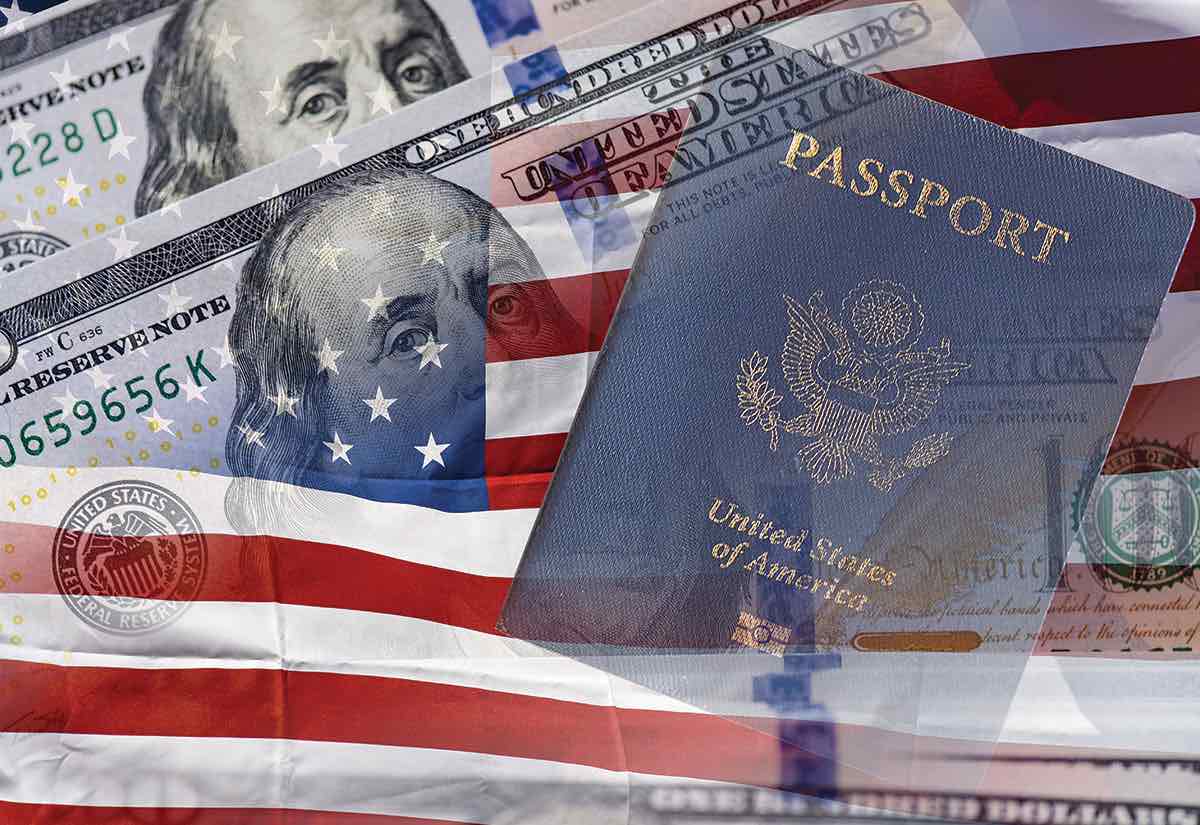 us passport with money and us flag