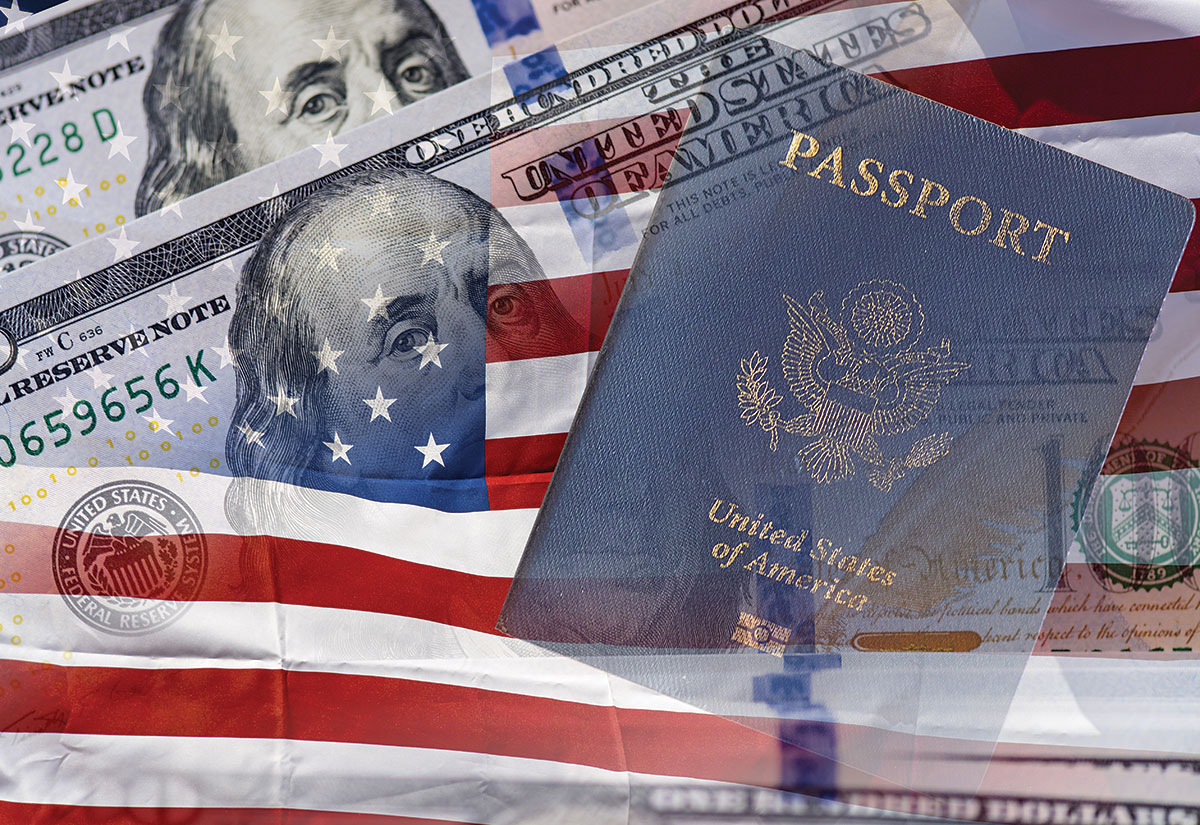 us passport with money and us flag