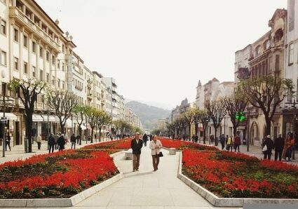 People walking through an urban plaza