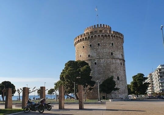 The White Tower of Thessaloniki, an iconic landmark and former fortress by the waterfront in Greece. 