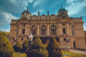 Old palace in Krakow, Poland against a blue sky - best digital nomad cities
