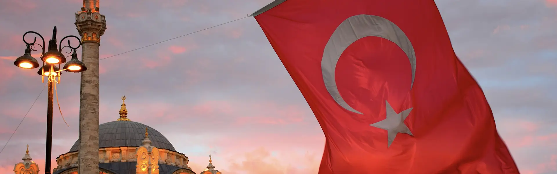 turkey flag with a mosque behind