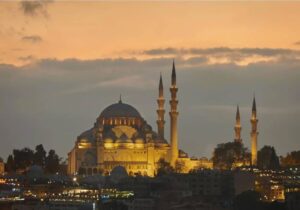 Sunset view of the illuminated Suleymaniye Mosque in Istanbul, Turkey
