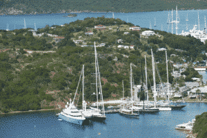 Yachts dotting the shoreline of Antigua and Barbuda - immigrate to these Caribbean countries