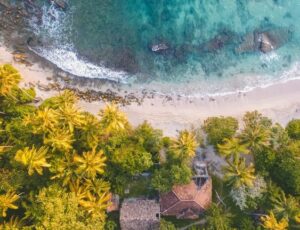 aerial visew of dickenson bay beach in antigua