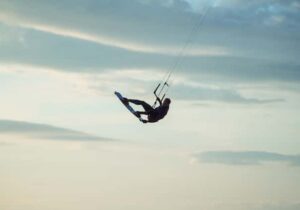 a kite surfer in the air