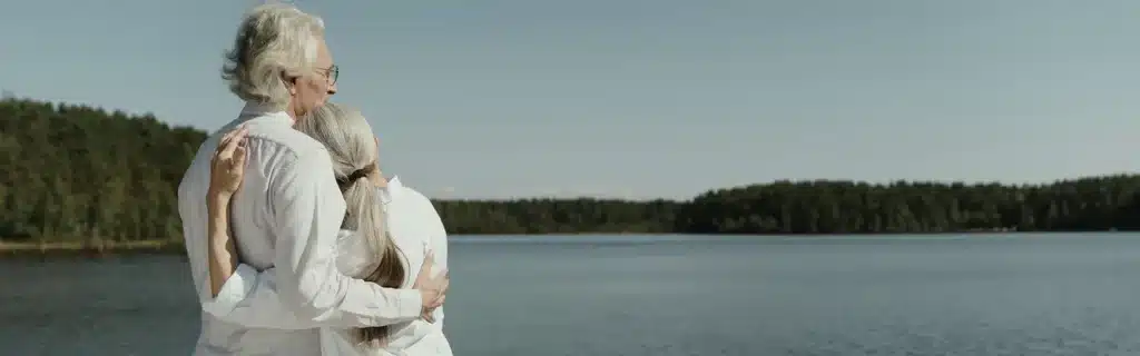 retired couple looking to a lake for healthcare in Turkey 