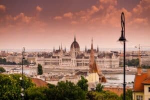Old building against a pink sky in Budapest, Hungary - best European cities for digital nomads