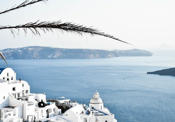 What houses in Greece overlooking the ocean. 