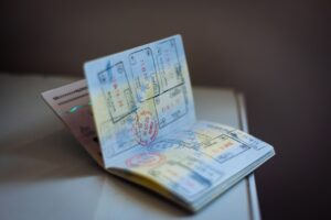 Open passport with visa stamps