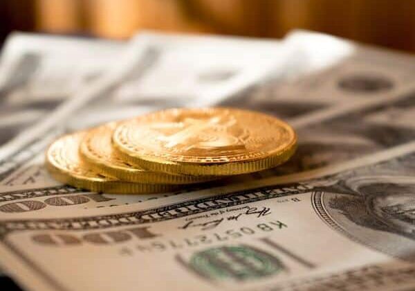 Gold coins on top of bank notes - FEIE for US citizens, taxes for dual nationality