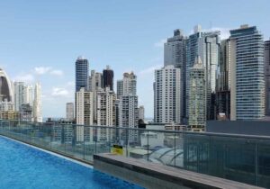 Image of Panama city and panama canal with large skyscrapers in background - living in Europe as a US citizen