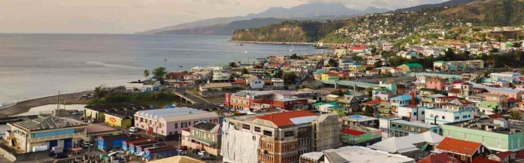 aerial view at sunset of downtown roseau in dominica