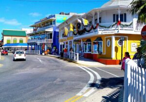 Colorful buildings in a street in the Cayman Islands - Dream destination for expats looking for no-tax countries