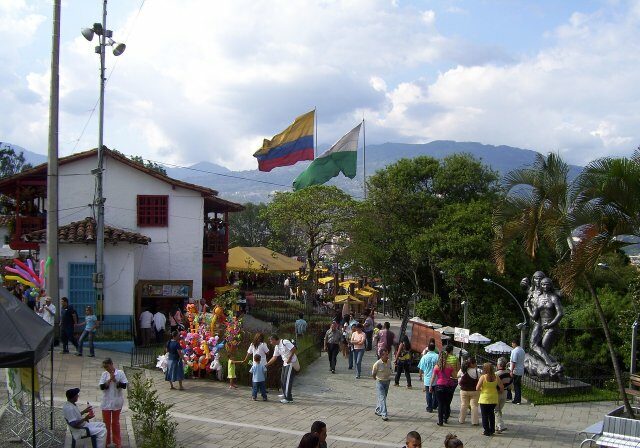 Town of Medellin in Colombia with bustling street and people walking - welcoming hubs for foreigners