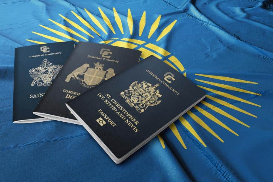 caribbean passports on top of a commonwealth nations flag