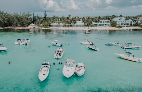 island view from the sea of and boats in the cayman islands