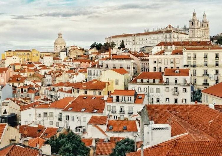 View of houses with orange terracotta roofs in Portugal - easy country to get permanent residency