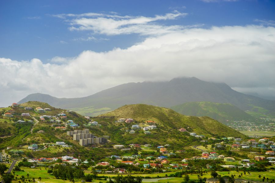 view-st-kitts-island-with-residential-area-lush-green-hills-background