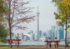 View over a lake at the CN Tower in Toronto, Canada - immigrate to these easy countries